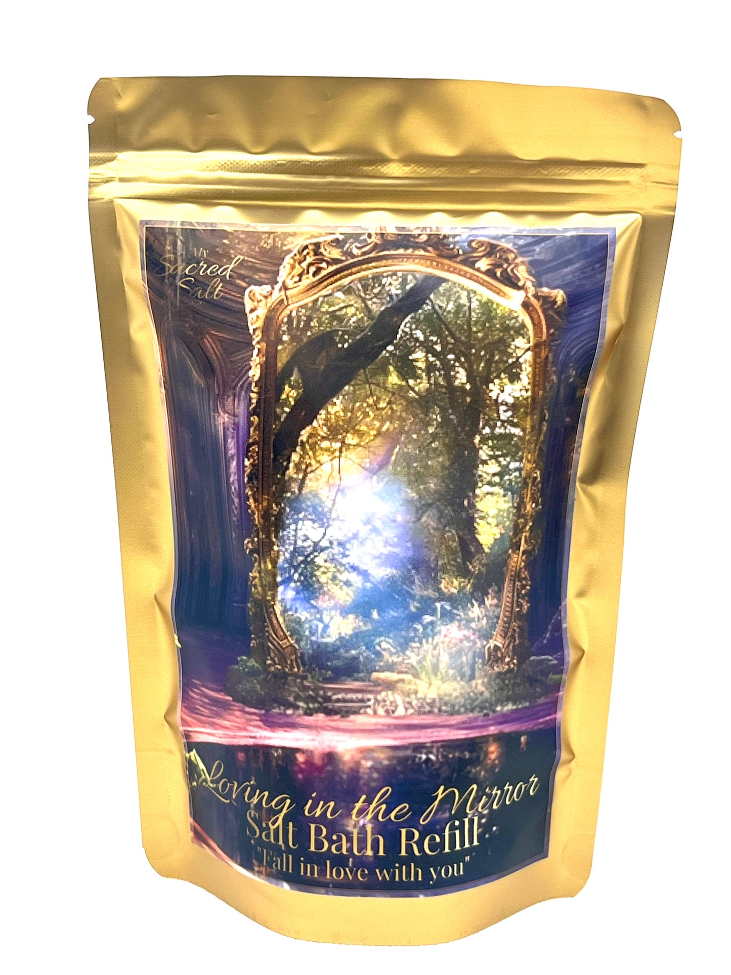 Gold packaging of a salt bath refill with a scenic image of a mirror reflecting a vibrant forest.