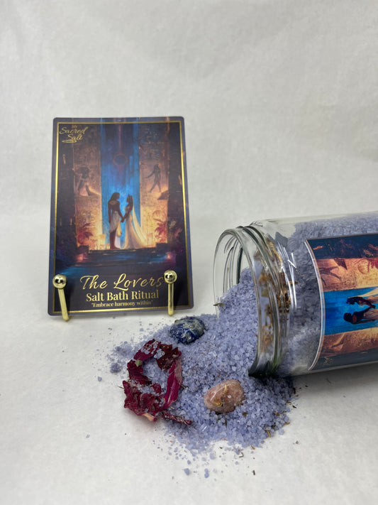 Jar of bath salts with a decorative card on a light gray surface