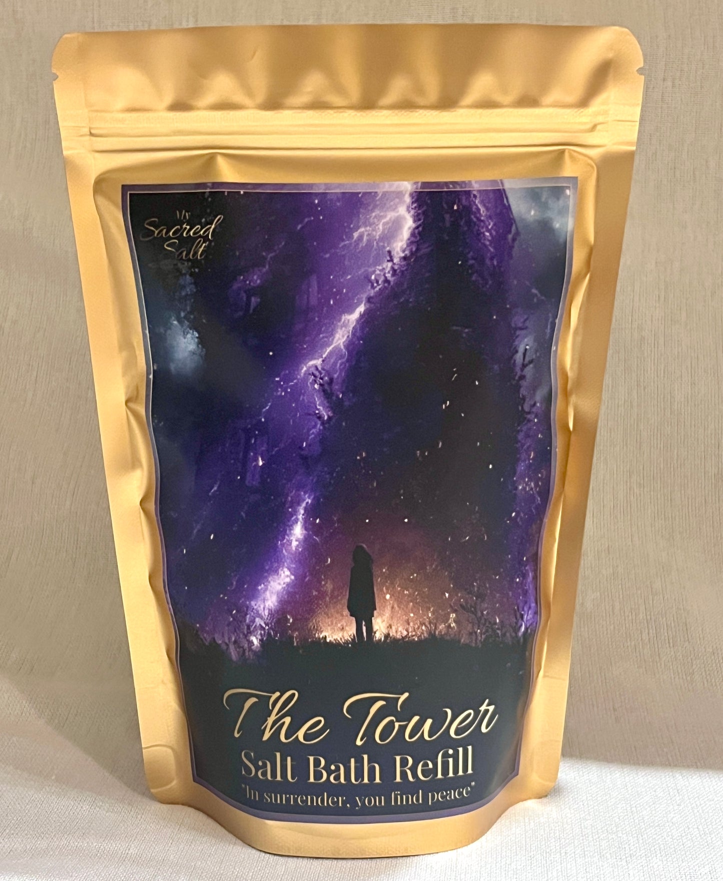 Salt bath refill package with a purple storm design and gold border on a dark background