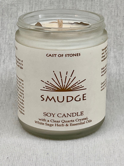 Soy candle in a glass jar with a label on a gray background