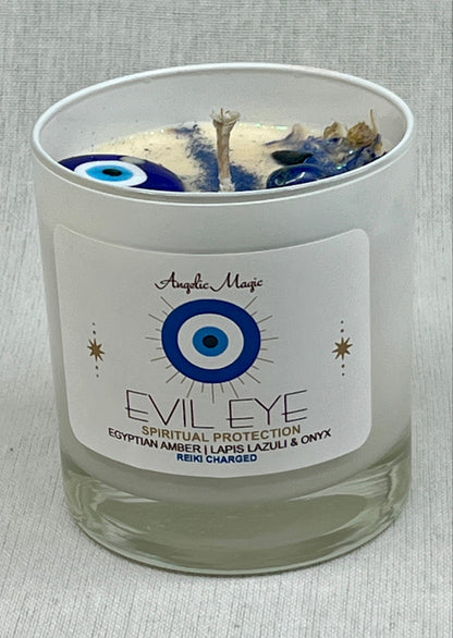 Candle with 'Evil Eye' label and decorative elements on a gray background