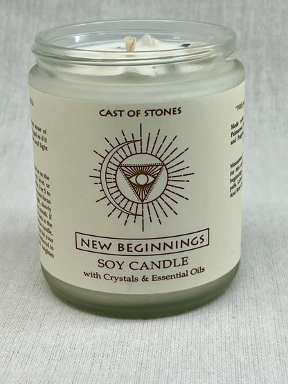 Soy candle in a glass jar with a label on a light gray background
