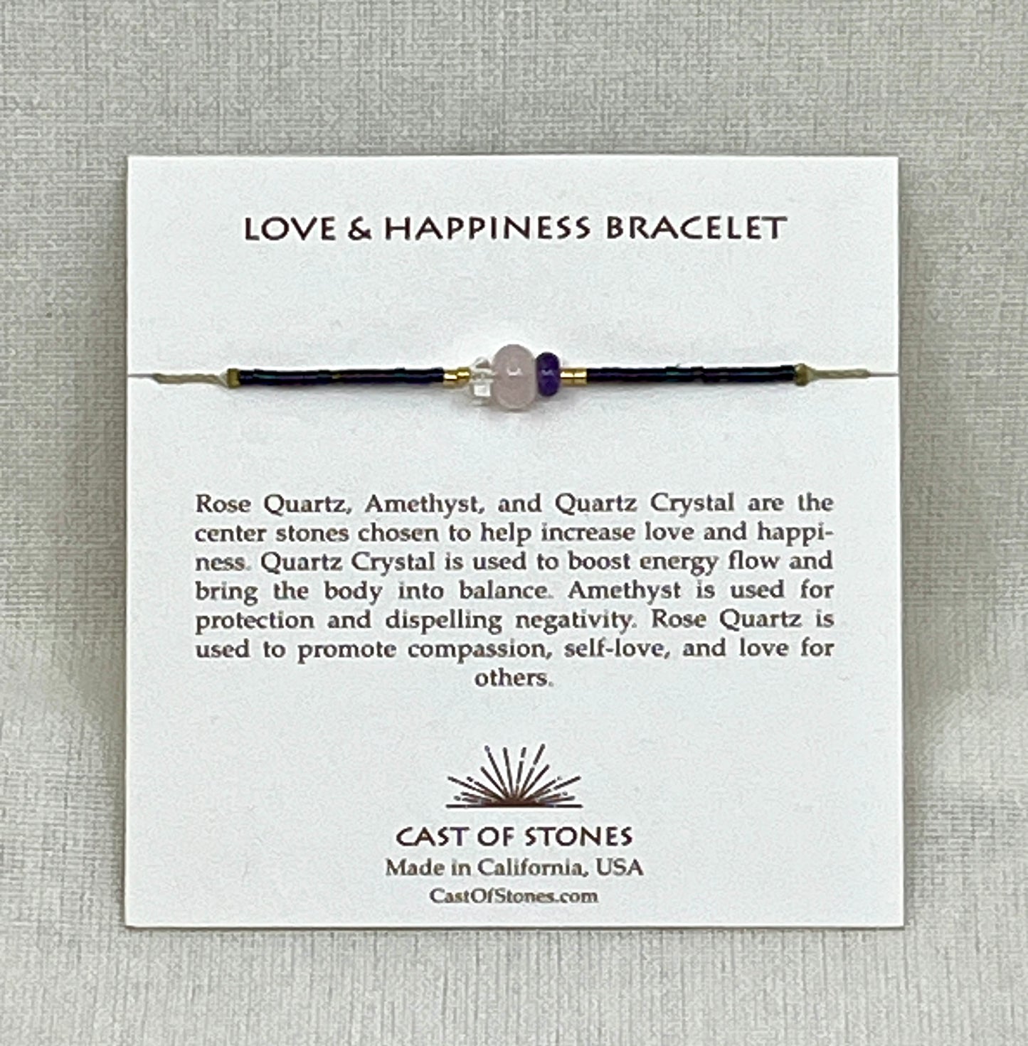 Love & Happiness Bracelet on a card with product description and brand information.