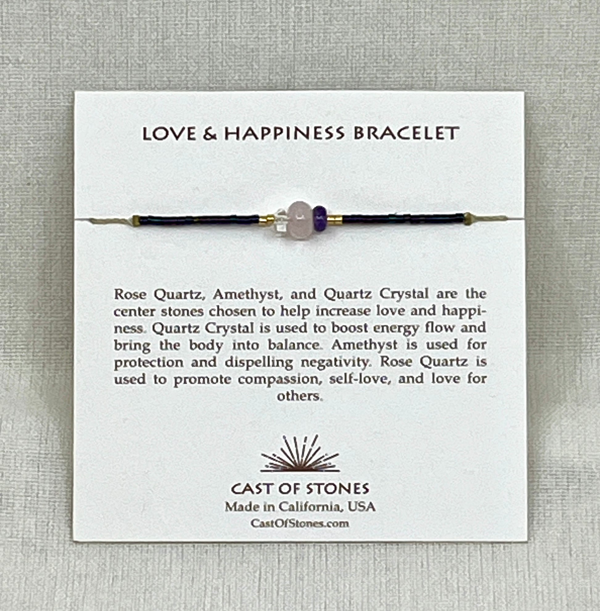 Love & Happiness Bracelet on a card with product description and brand information.