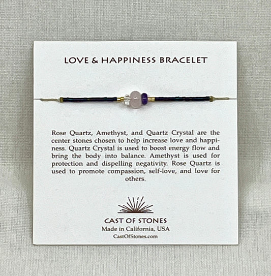 Love & Happiness Bracelet on a card with product description and brand information.