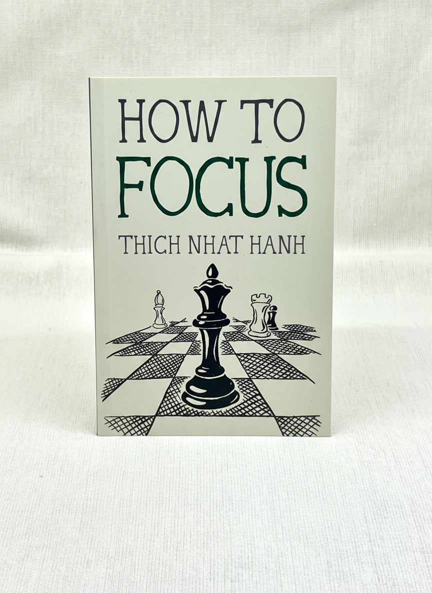 Book titled 'How to Focus' by Thich Nhat Hanh on a light background