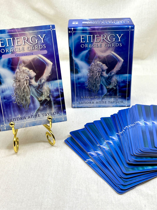 Energy Oracle Cards by Sandra Anne Taylor with cards and guidebook on a white background