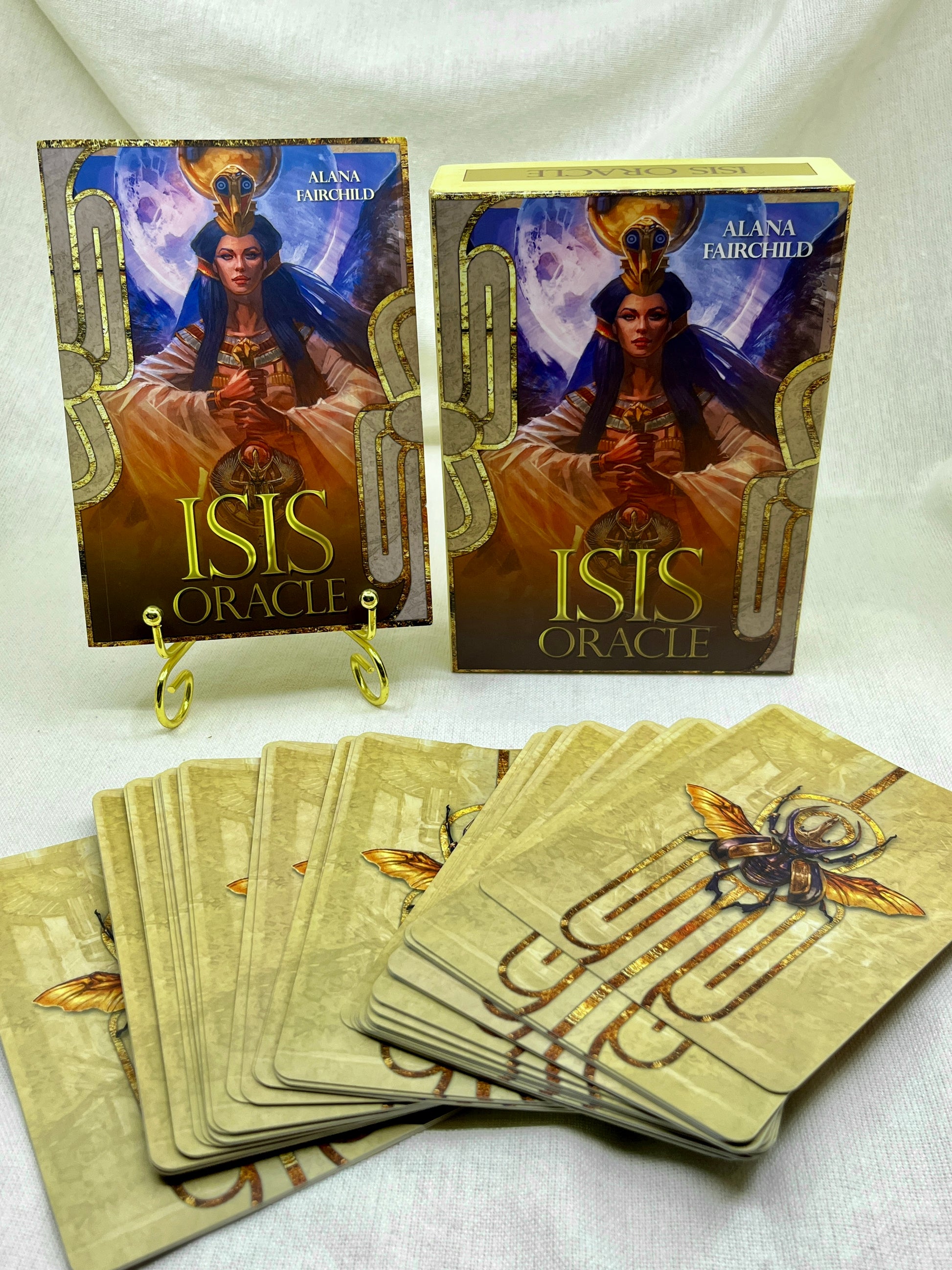Isis Oracle cards with packaging on a white background
