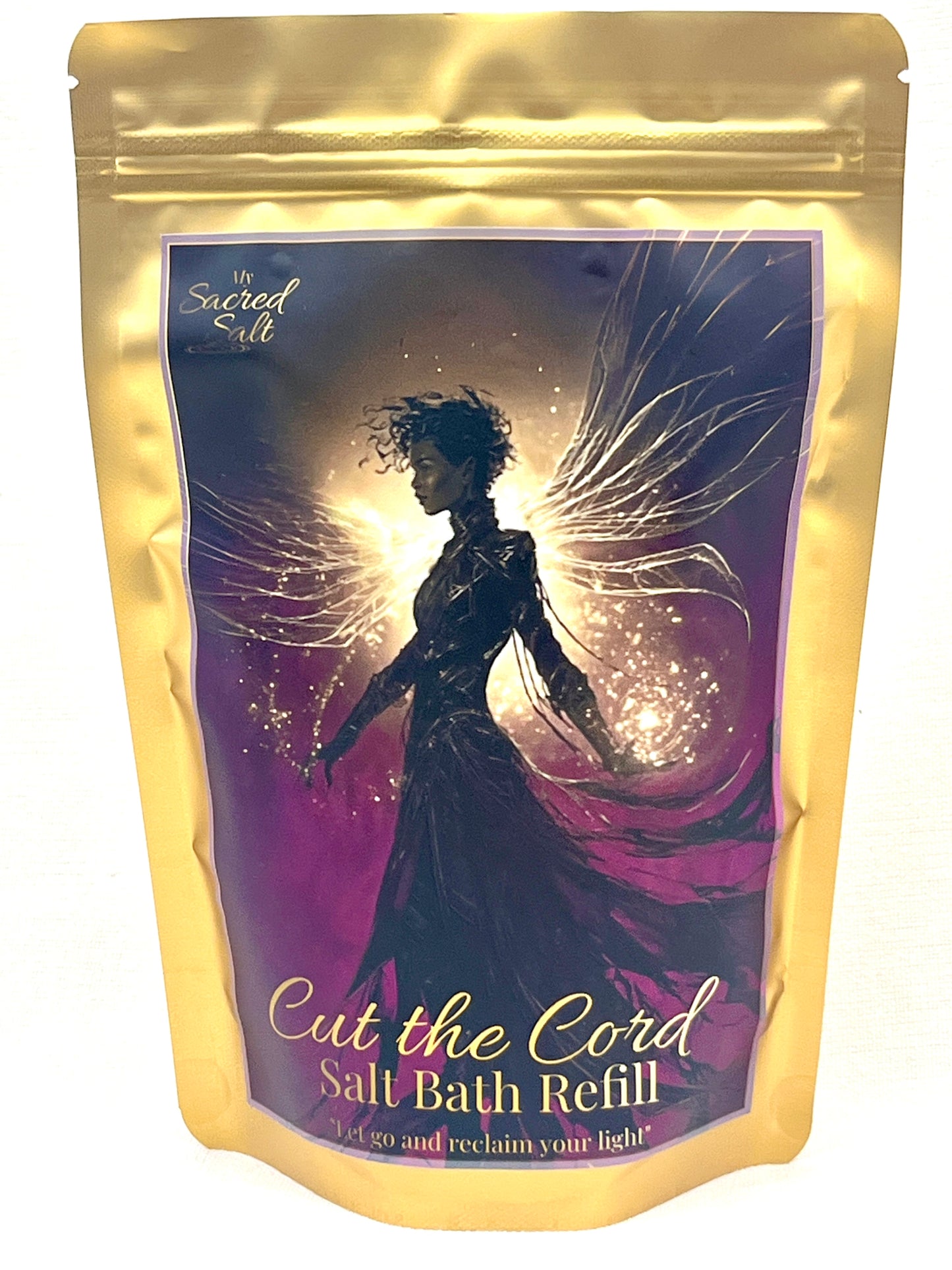 Salt bath refill package with a fairy design and text on a purple and gold background