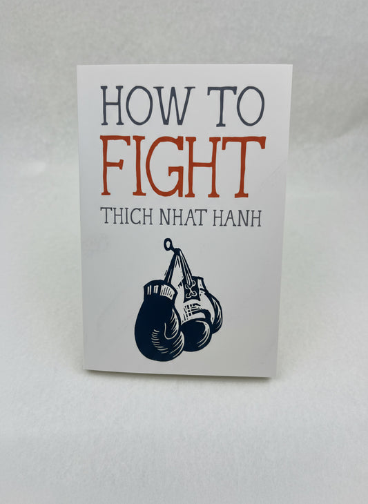 Book cover of 'How to Fight' by Thich Nhat Hanh with boxing gloves illustration on a white background