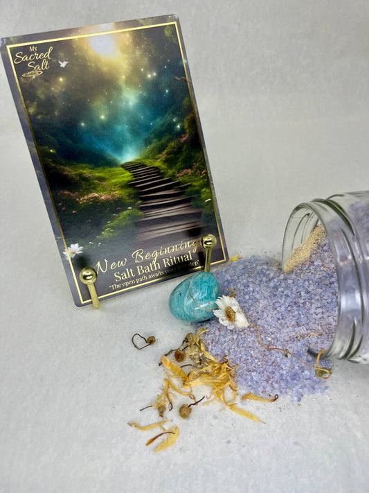 Salt bath ritual kit with a card and jar of purple salt on a textured surface