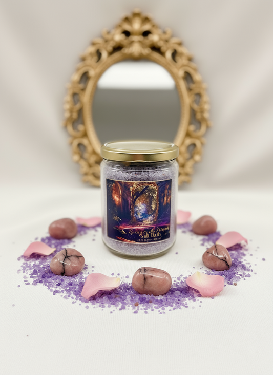 Candle jar with decorative label on a white surface with decorative elements