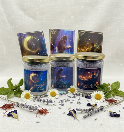 Three jars of salt bath products from the Wash it Away Salt Bath Collection with decorative labels and botanicals on a white background