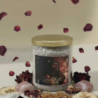 Jar of Goddess Salt Bath with decorative elements on a textured surface