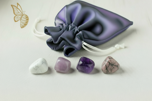 Purple drawstring bag with crystals on a light background