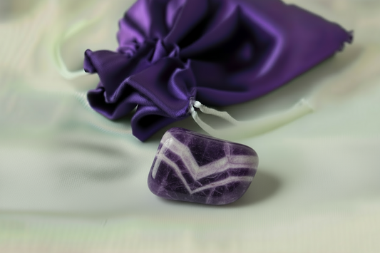 Purple stone with white veins on a light background