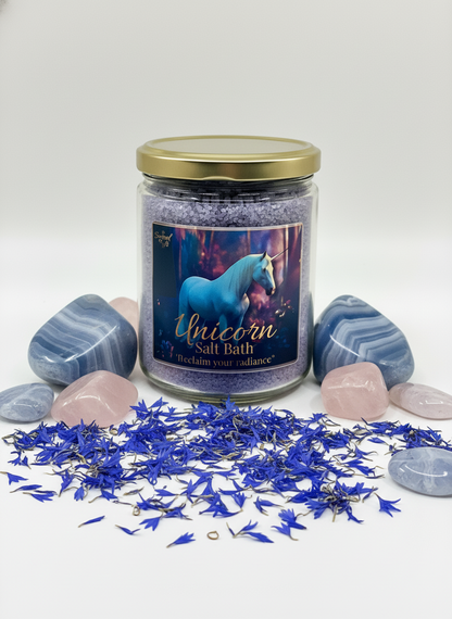 Jar of unicorn-themed salt bath with decorative stones and flowers on a white background